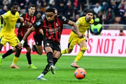 AC Milan Tops Serie A with Nkunku's Brace in 3-0 Victory Over Verona