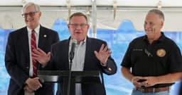 an image of Congressman Tim Moore Invests in Gene Therapy Company GNPX Amid High Volatility