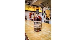 an image of Rebel Bourbon Reintroduces Root Beer Whiskey at $19.99, Infused with Natural Flavors