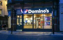 an image of Domino's Pizza Shares Decline as Analyst Lowers Price Target