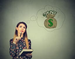 an image of Cathie Wood Increases Stock Holdings Amid Market Volatility