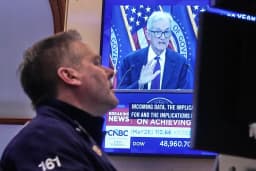 US Jobs Report Exceeds Expectations, Stocks Little Changed