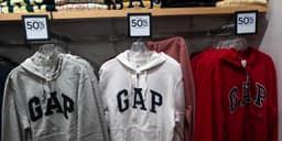 an image of Consumer Resilience Exceeds Tesla Stock: Three Charts Illustrate the Narrative