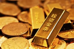 an image of Gold Drops More Than 1%; Uber Stock Decreases Following Q3 Earnings Report