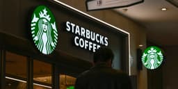 an image of Starbucks Reports Earnings Below Expectations, Yet Stock Price Increases.