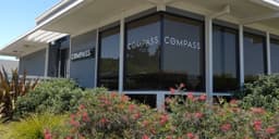 an image of Compass and Anywhere Merger Scheduled to Finalize on Friday, Creating a Major Real Estate Brokerage Powerhouse.