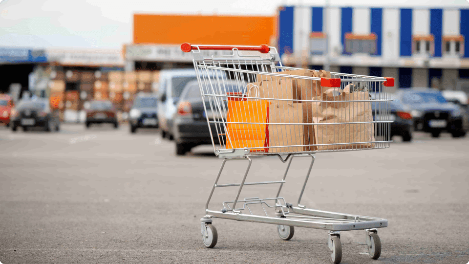 an image of A shopping cart in a car park