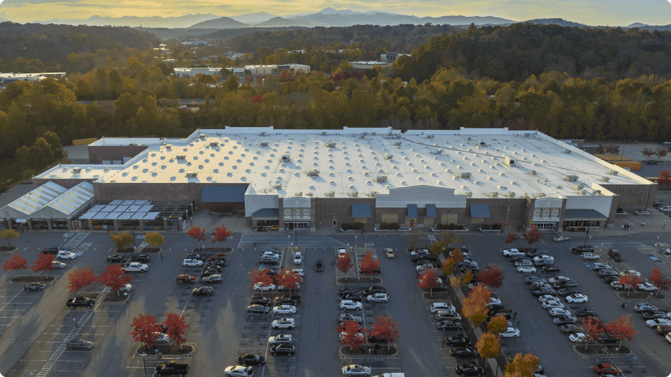 an image of Costco vs Walmart image of a carpark near a larger retailer